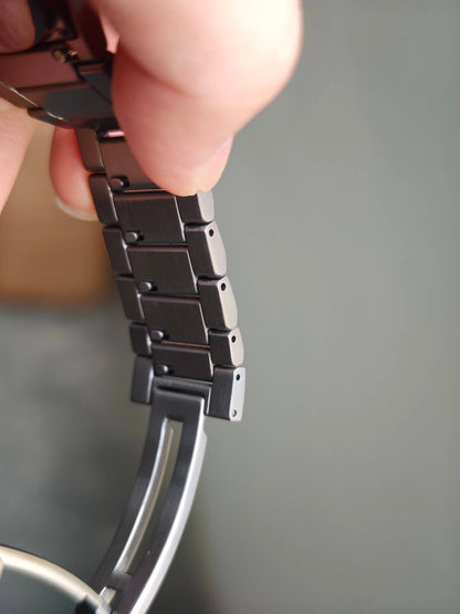Quick release fold-over clasp with TITANIUM stamp engraved on buckle