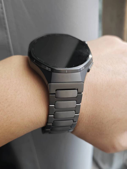 HUAWEI Watch GT 6 Pro titanium bracelet band worn on wrist with 46mm black dial case